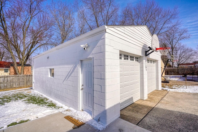 detached garage with fence