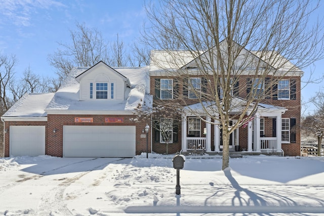 colonial home with a garage