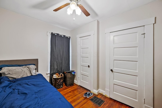 bedroom featuring ceiling fan and wood-type flooring