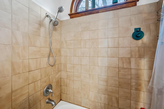 bathroom featuring shower / bath combo with shower curtain