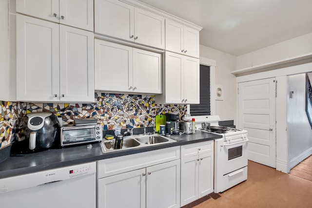 kitchen with tasteful backsplash, sink, white appliances, and white cabinets