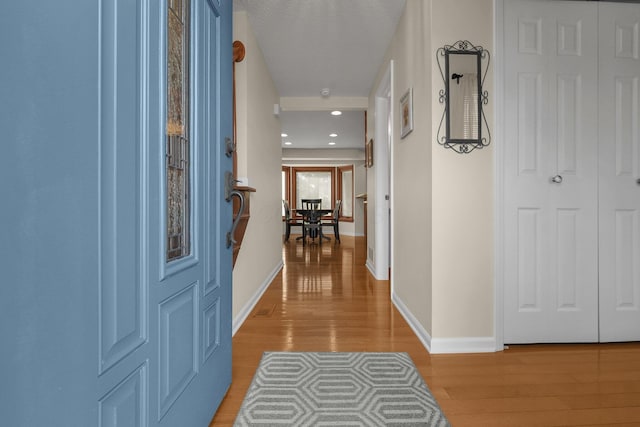 hall featuring light hardwood / wood-style flooring