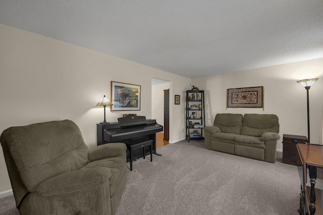 carpeted living room featuring a textured ceiling