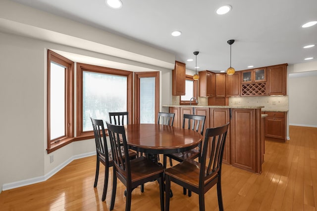 dining room featuring light hardwood / wood-style floors