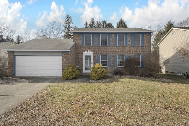 colonial-style house with a garage and a front yard