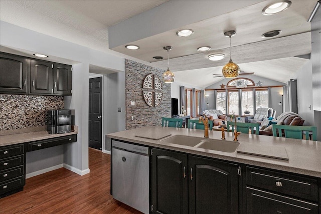 kitchen with backsplash, decorative light fixtures, open floor plan, dark wood-style floors, and stainless steel dishwasher