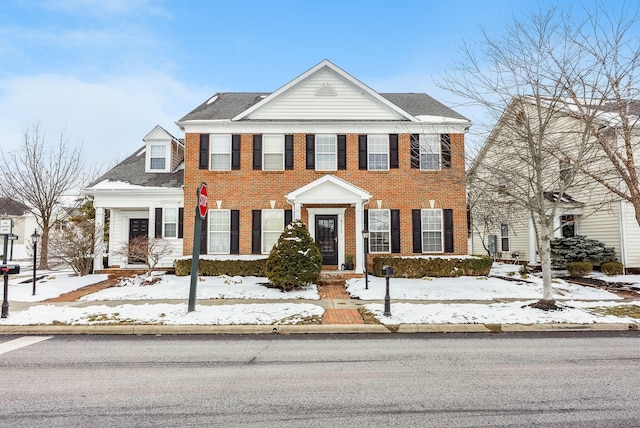 view of front of property with brick siding