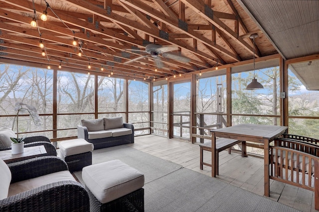 sunroom with a ceiling fan