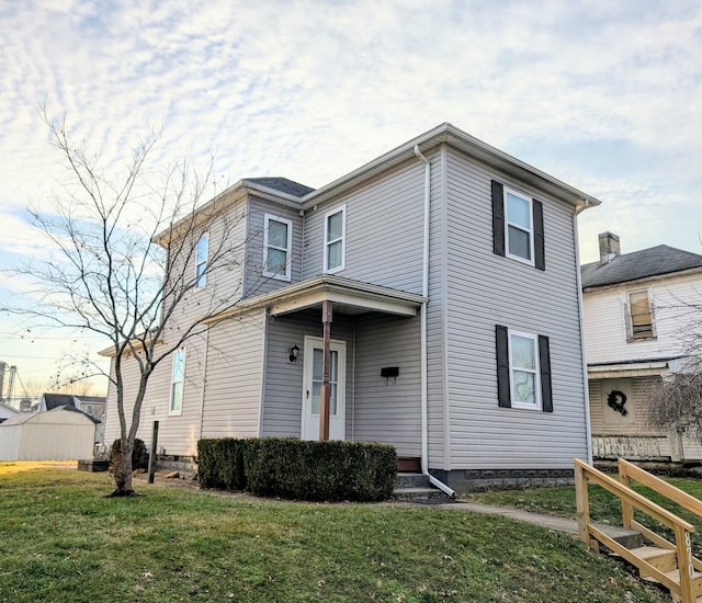 front of property with a front yard