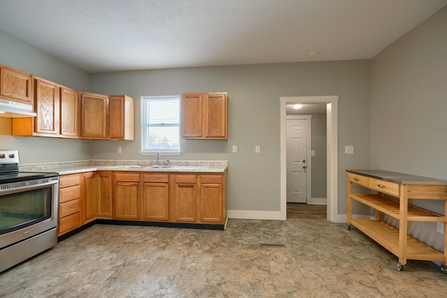 kitchen featuring sink and stainless steel electric range