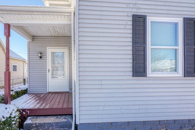 doorway to property featuring a deck