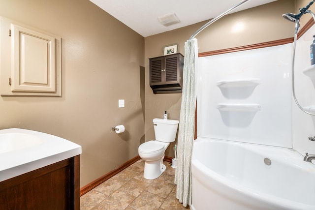 bathroom featuring baseboards, shower / tub combo with curtain, vanity, and toilet