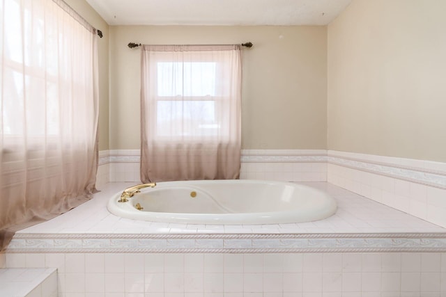 bathroom featuring a garden tub