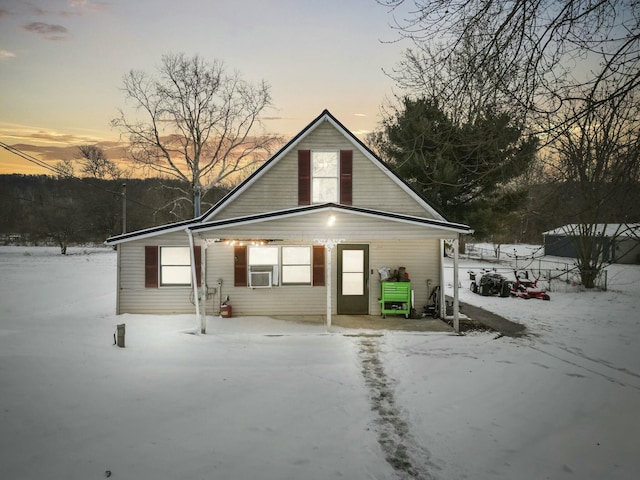 view of front of property featuring cooling unit