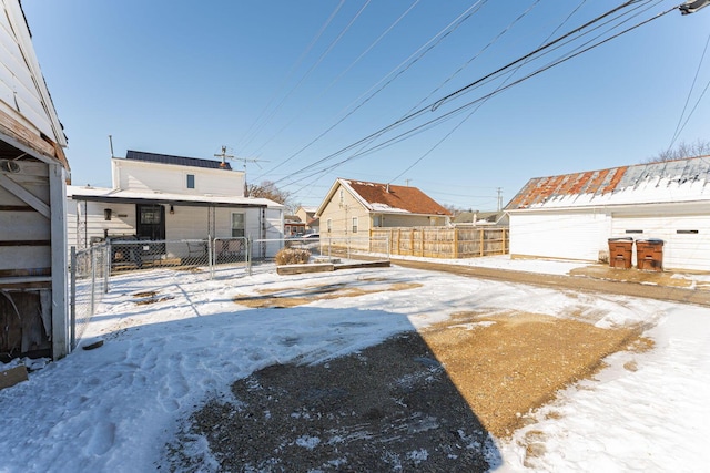 view of yard layered in snow