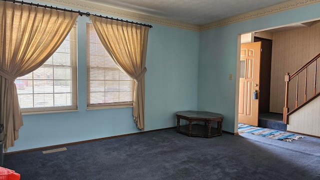 unfurnished room featuring carpet floors