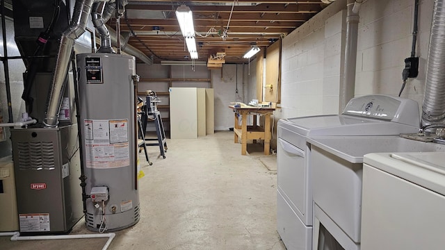 basement with separate washer and dryer and gas water heater