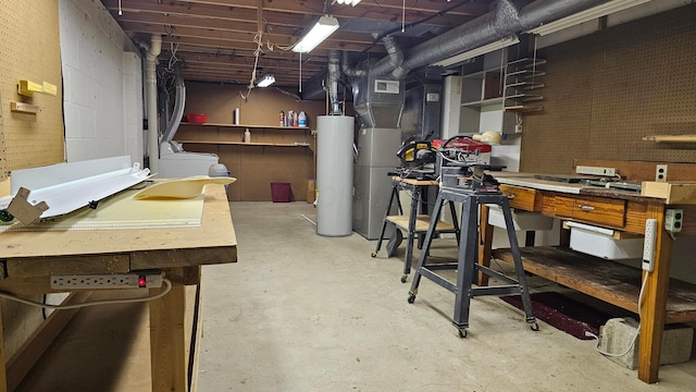 basement with a workshop area and gas water heater