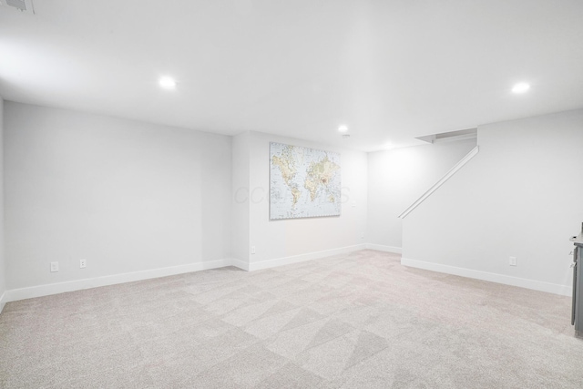 basement with light carpet