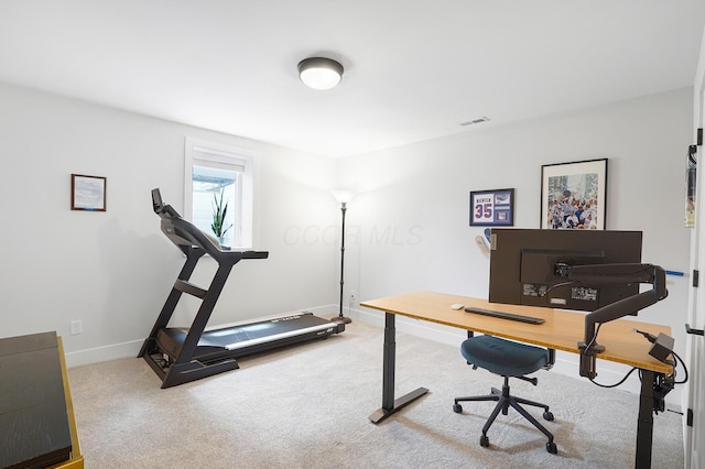 home office featuring carpet flooring