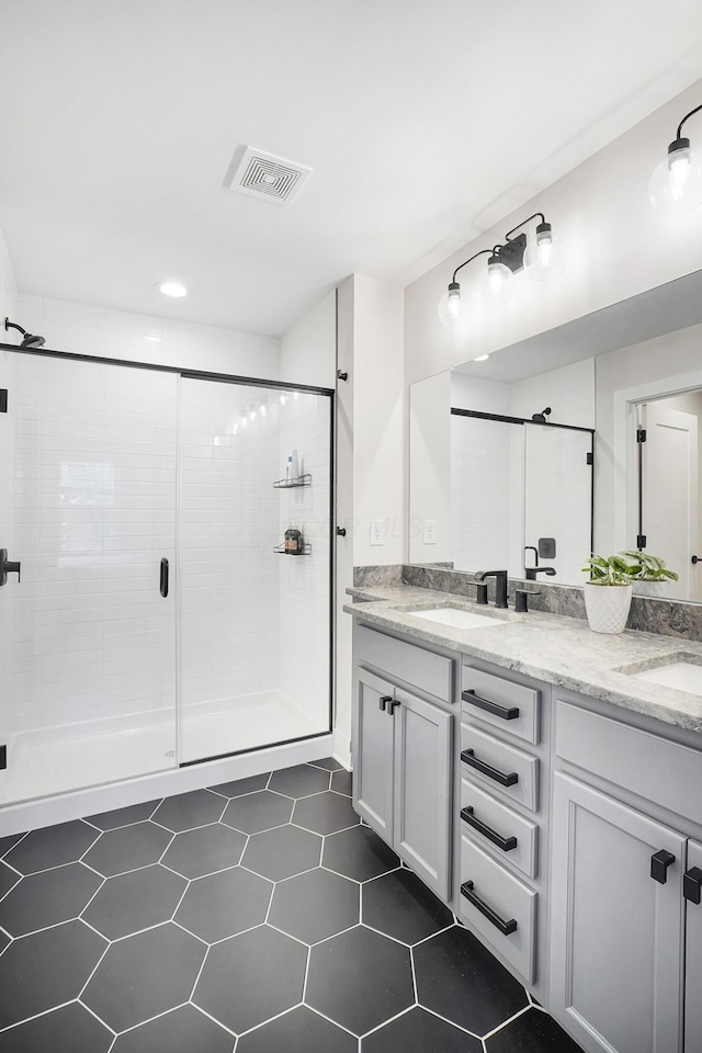 bathroom featuring vanity and walk in shower