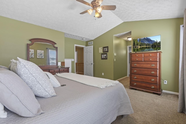 bedroom featuring vaulted ceiling, carpet floors, a textured ceiling, and visible vents