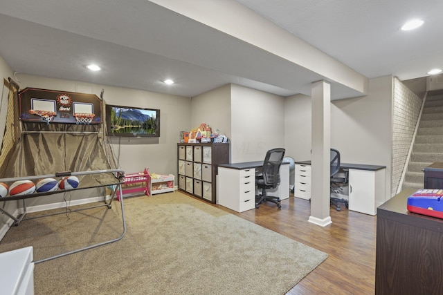 office area featuring baseboards, wood finished floors, and recessed lighting