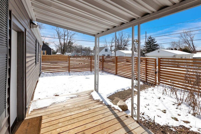 view of snow covered deck