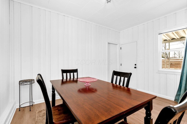 dining room with light hardwood / wood-style floors