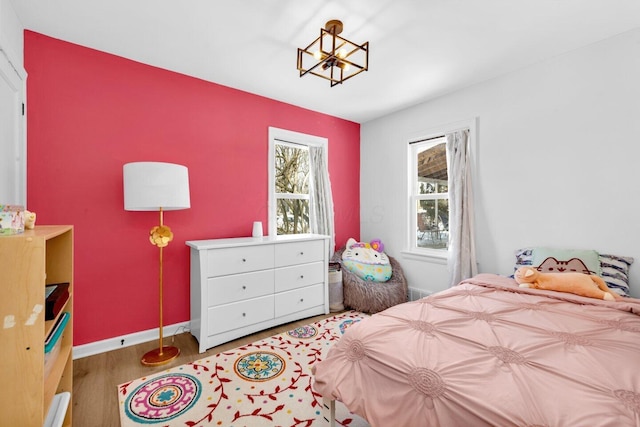 bedroom featuring hardwood / wood-style floors