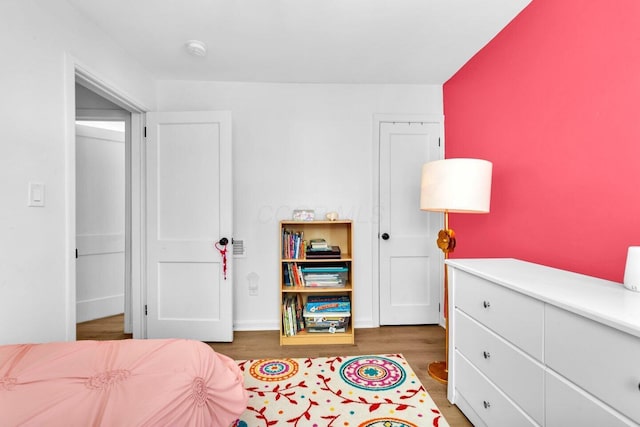 bedroom featuring dark wood-type flooring