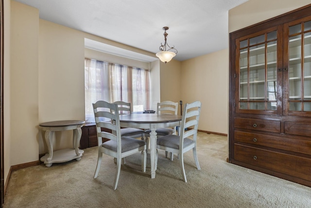 view of carpeted dining room