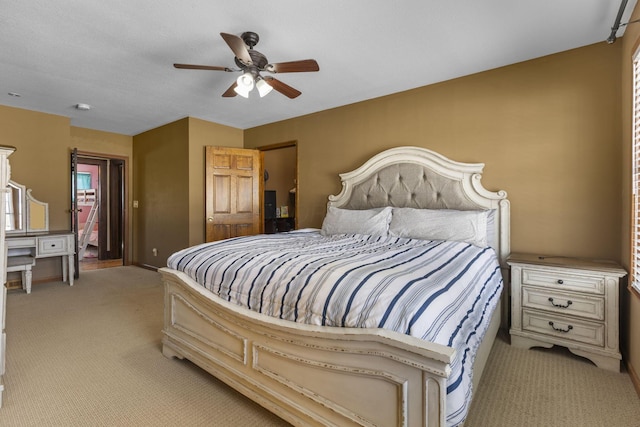 carpeted bedroom featuring access to outside and ceiling fan