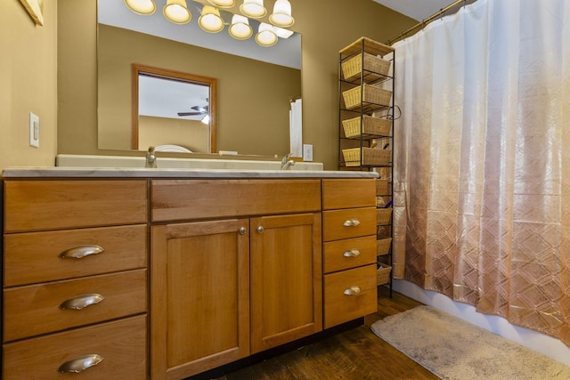 bathroom featuring hardwood / wood-style flooring and vanity