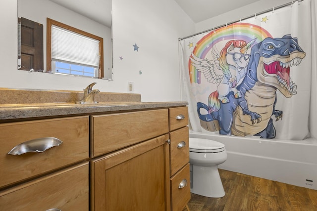 full bathroom with hardwood / wood-style flooring, vanity, toilet, and shower / bathtub combination with curtain