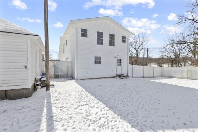 view of snow covered house