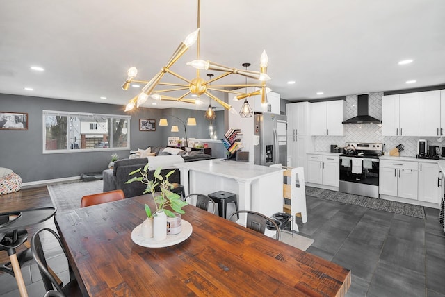 dining area with baseboards and recessed lighting