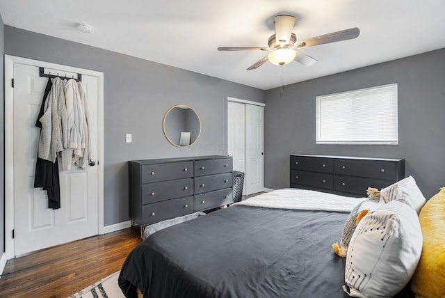 bedroom with baseboards, a ceiling fan, and wood finished floors