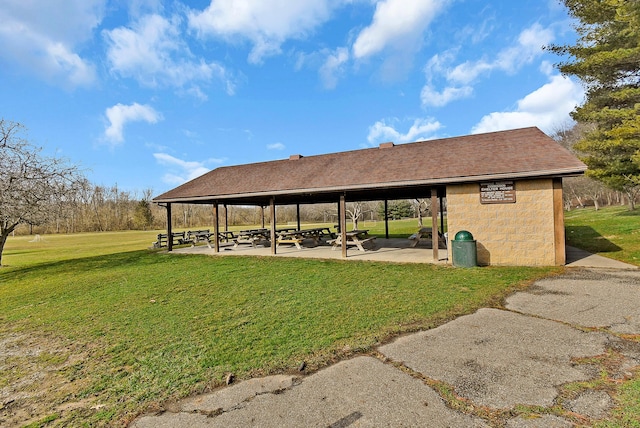 view of home's community with a yard and a gazebo