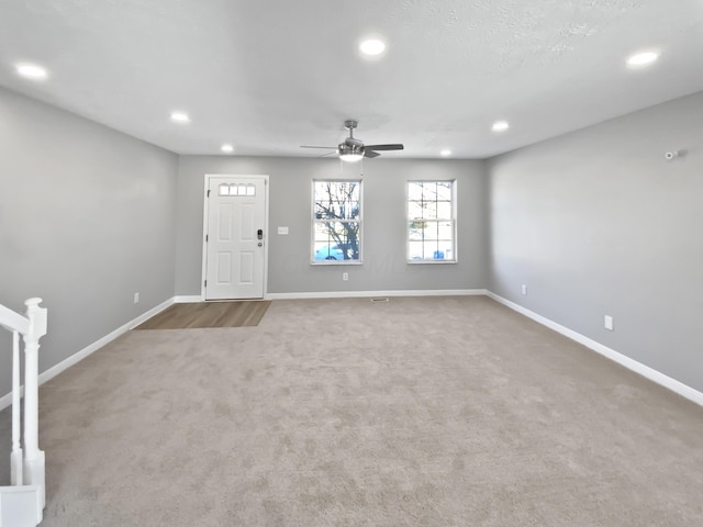 foyer entrance featuring carpet, recessed lighting, a ceiling fan, and baseboards