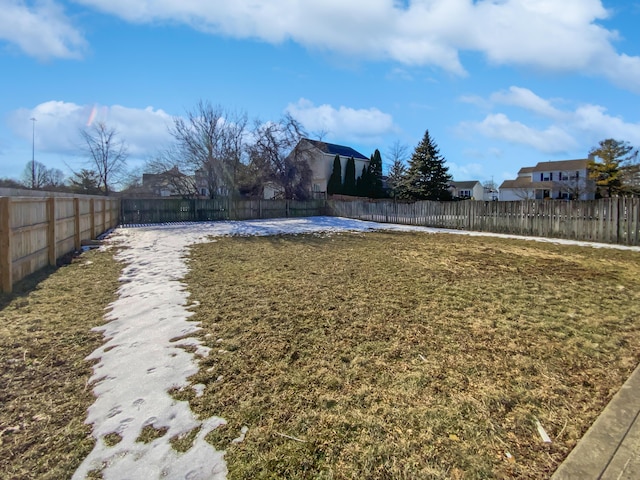 view of yard featuring a fenced backyard