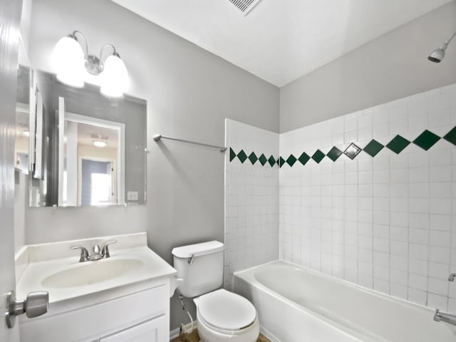 full bathroom with visible vents, shower / bath combination, vanity, and toilet