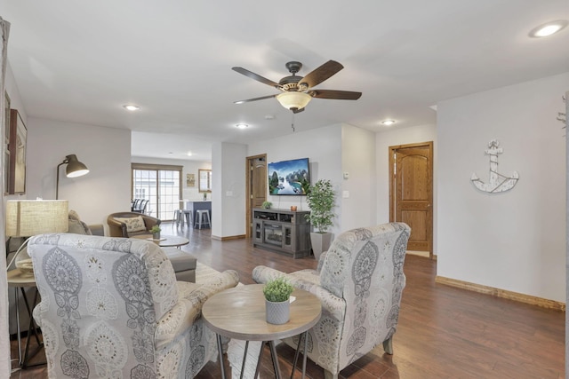 living room with ceiling fan, dark wood-style flooring, recessed lighting, and baseboards