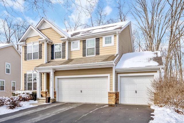 view of front of property with a garage