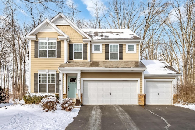 view of front of property with a garage