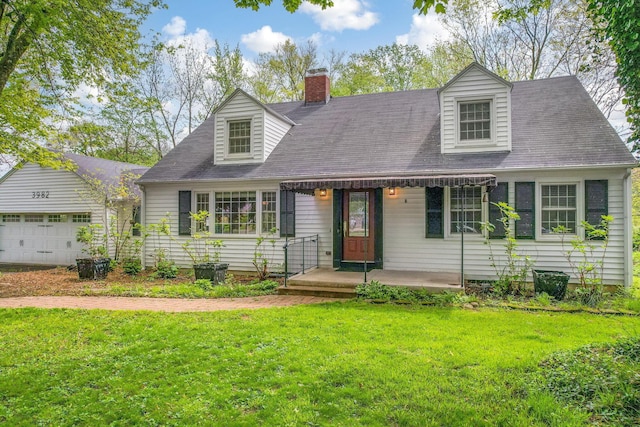 cape cod home featuring a front lawn and a chimney