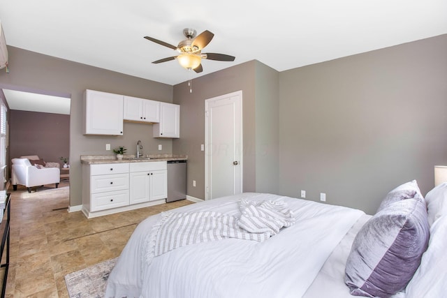 bedroom with a sink, baseboards, and a ceiling fan