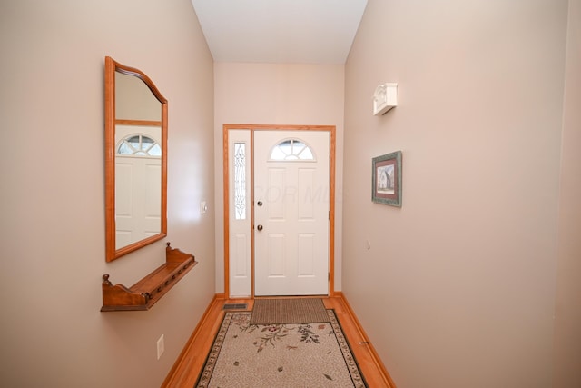 doorway featuring hardwood / wood-style floors