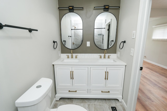 189 N Gould Rd, Bexley, OH 43209 - full bath with toilet, a shower, double vanity, and baseboards