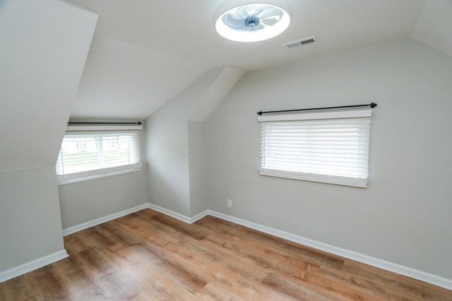 189 N Gould Rd, Bexley, OH 43209 - bonus room featuring lofted ceiling, wood finished floors, and baseboards